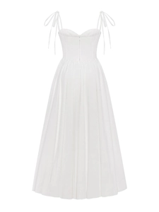 Détail de la robe en coton avec bretelles réglables et fermeture éclair invisible au dos