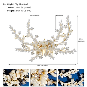Detailed view of handmade bridal hair comb with pearls, rhinestones and golden leaf accents