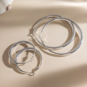 Classic silver stainless steel hoop earrings in various sizes with high-polished finish