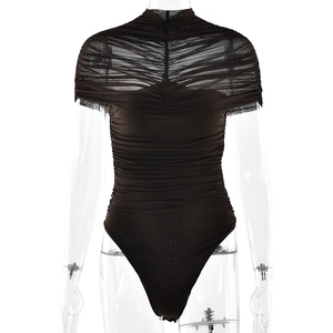 Detail shot of the sheer mesh stitching and ruched design on this black bodysuit