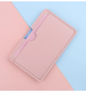 Slim pink PU leather card holder with precise edge stitching and single card slot detail