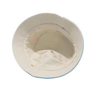 Kids reversible bucket hat in sky blue and cream white cotton canvas for outdoor sun protection
