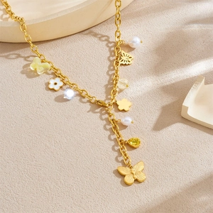 Collana a Y dorata con ciondoli a farfalla, fiori, perle e gemme colorate eleganti