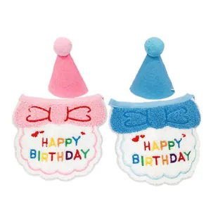 Pink and blue pet birthday party set with embroidered bibs and pom-pom hats