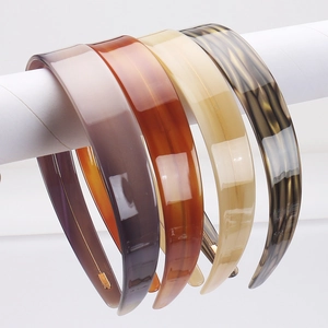Detail view of 2.2cm wide tortoiseshell acetate headbands in four elegant colors