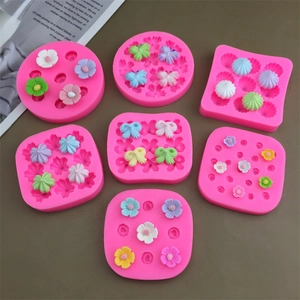Pink silicone molds for flower, butterfly, bow, and star shapes for cake and DIY crafts