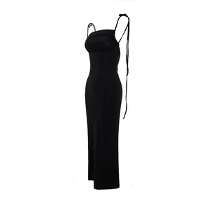 Detail of a black ruched bodycon maxi dress featuring a sexy backless design and slim straps