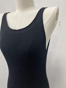 Close-up of black ribbed knit vest with classic round neck on a mannequin