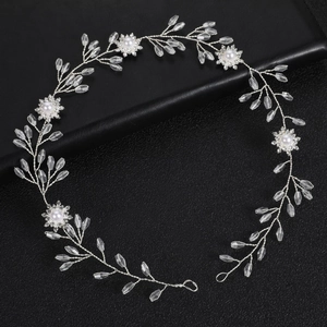 Elegant silver bridal hair vine with sparkling crystals and white pearl flower accents