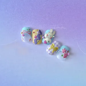 Detail view of 5D embossed nail stickers featuring 3D rabbit and floral motifs