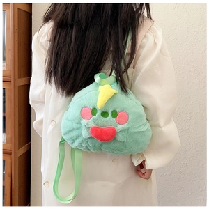Rear view of a child wearing a green plush dumpling backpack with cute cartoon features