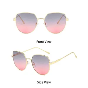 Women's cat eye metal sunglasses with large gradient lenses and gold frames