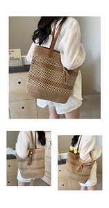 Detail view of khaki hollow woven straw tote bag featuring brown leather shoulder straps