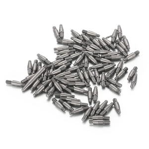 Industrial stainless steel threaded pins and metal fasteners displayed in a bulk stack