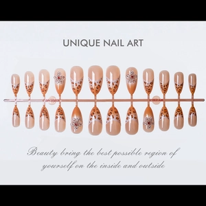Detailed set of 24 almond-shaped press-on nails with leopard print and 3D floral accents