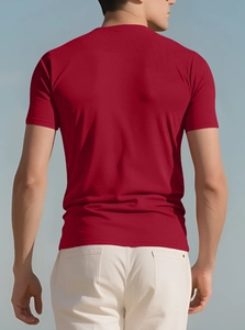 Back view of a red men's athletic stretch T-shirt showing fit and fabric texture