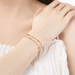 Minimalist double-layer stainless steel beaded chain bracelet in 18K gold finish for women