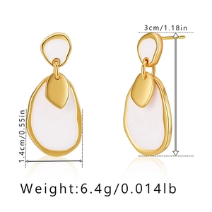Detailed view of vintage heart earrings with size dimensions and weight in inches