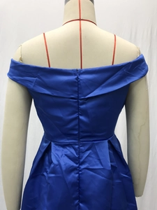 Detail of royal blue satin evening gown with back invisible zipper and off-shoulder design