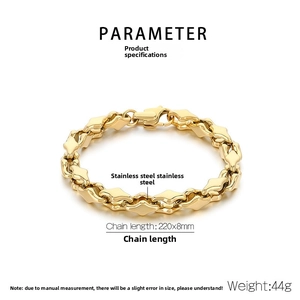 Close-up of golden stainless steel geometric diamond link bracelet with lobster clasp details