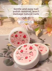 Close-up of 32-piece strawberry scented nail polish remover pads in a compact round box