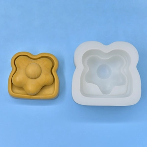 White silicone fried egg toast mold for DIY baking with yellow flower shape sample