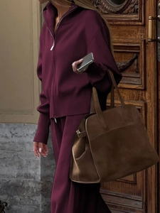 Elegant wine red long-sleeved knitted tracksuit set with zip jacket and matching pants