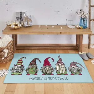 Blue Christmas gnomes floor mat with Merry Christmas text for indoor holiday decoration