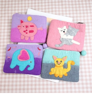 Handmade wool felt animal coin purses with zipper in purple and pink tones