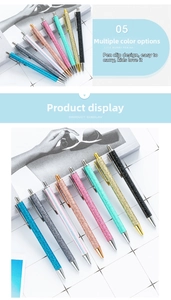 Close-up of eight glitter metallic retractable ballpoint pens in diverse vibrant colors
