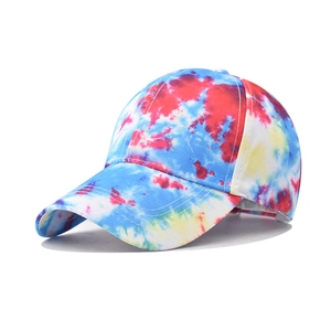 Colorful tie-dye gradient baseball cap with vibrant starry sky pattern and curved brim