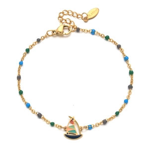 Close-up of sailboat pendant with colorful enamel and beads on a gold stainless chain