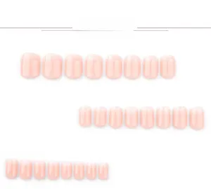 Detail of glossy pink gradient press-on nails in various sizes on white background