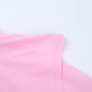 Macro shot of precise stitching and texture on pink sleeveless dress fabric