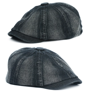 Close-up of black vintage washed denim newsboy cap with classic paneled design