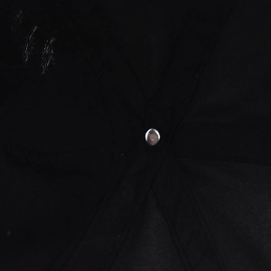 Detail view of reinforced stitching and metal rivet inside the washed cotton baseball cap