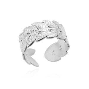Close-up of silver adjustable leaf ring showing intricate carved texture and veins