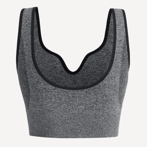 Seamless grey knitted sports bra with black trim and racerback for yoga fitness
