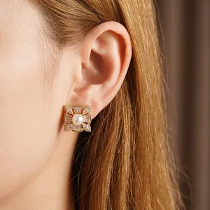 Elegant square pearl earrings with zircon inlay on a model, French retro gold-plated style