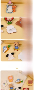 Close-up of laser-cut acrylic bear pins with vibrant digital printing details