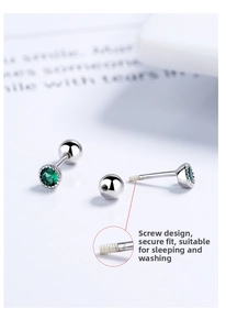 Detail of silver screw back earring with green zircon and secure threaded structure