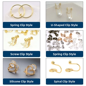 Detail view of various french vintage clip-on earring converters in gold and silver finishes