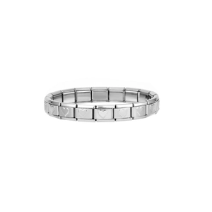 Detail of silver elastic modular bracelet featuring engraved heart patterns on metal links