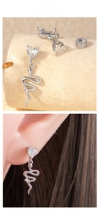 Détail de boucles d'oreilles serpent cœur avec zircone et fermoir à vis sécurisé