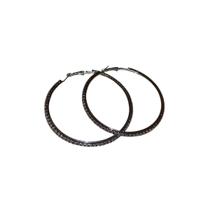 Chic silver-tone oversized hoop earrings with a textured surface and minimalist design