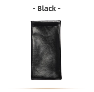 Close-up of black Saffiano PU leather sunglasses pouch with textured surface finish