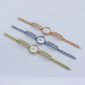 Detailed view of fashion quartz watches in gold, silver and rose gold with crystal straps