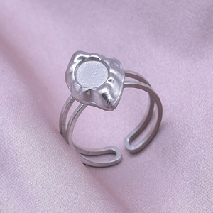 Detail shot of silver adjustable double-layer ring base with round bezel for jewelry DIY