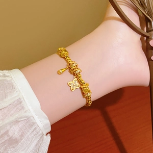 Élégant bracelet fleurs plaqué or 24 carats avec trèfle en zircon et cloche au poignet