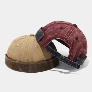 Washed cotton docker hats in khaki and burgundy with retro patchwork and adjustable strap